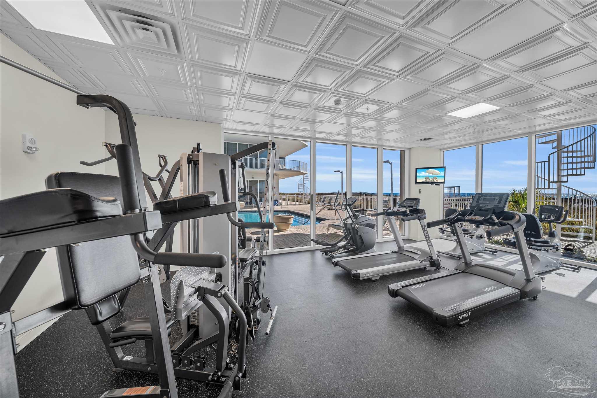 17361 Perdido Key Drive, Unit 1002W Perdido Key, FL 32507 - Photo 51 of 64 a view of a room with gym equipment