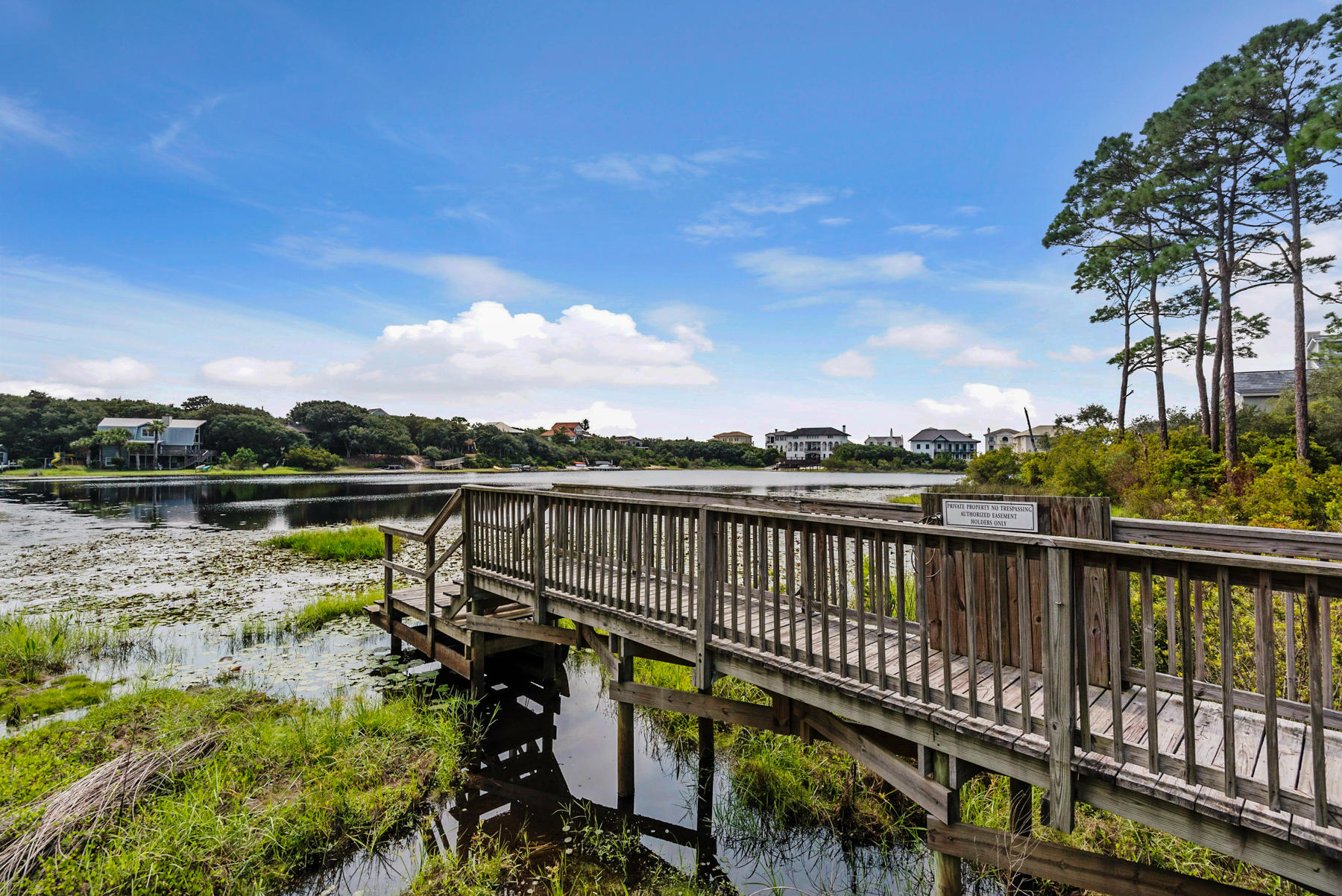 Lot 10 Loon Lake Drive Santa Rosa Beach, FL 32459 - Photo 14 of 49 a view of a lake with a deck