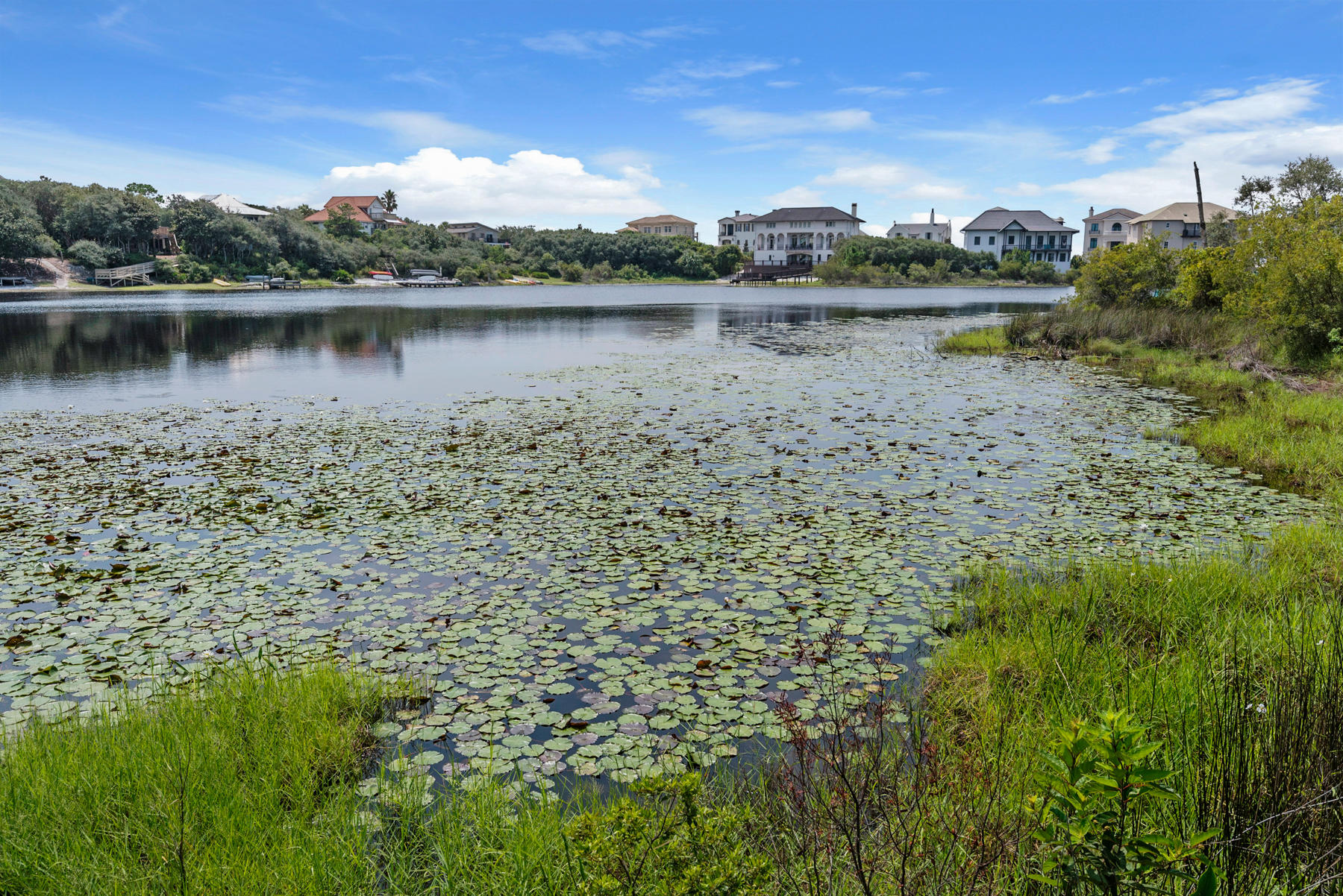 Lot 10 Loon Lake Drive Santa Rosa Beach, FL 32459 - Photo 16 of 49 a view of a lake with houses in the back