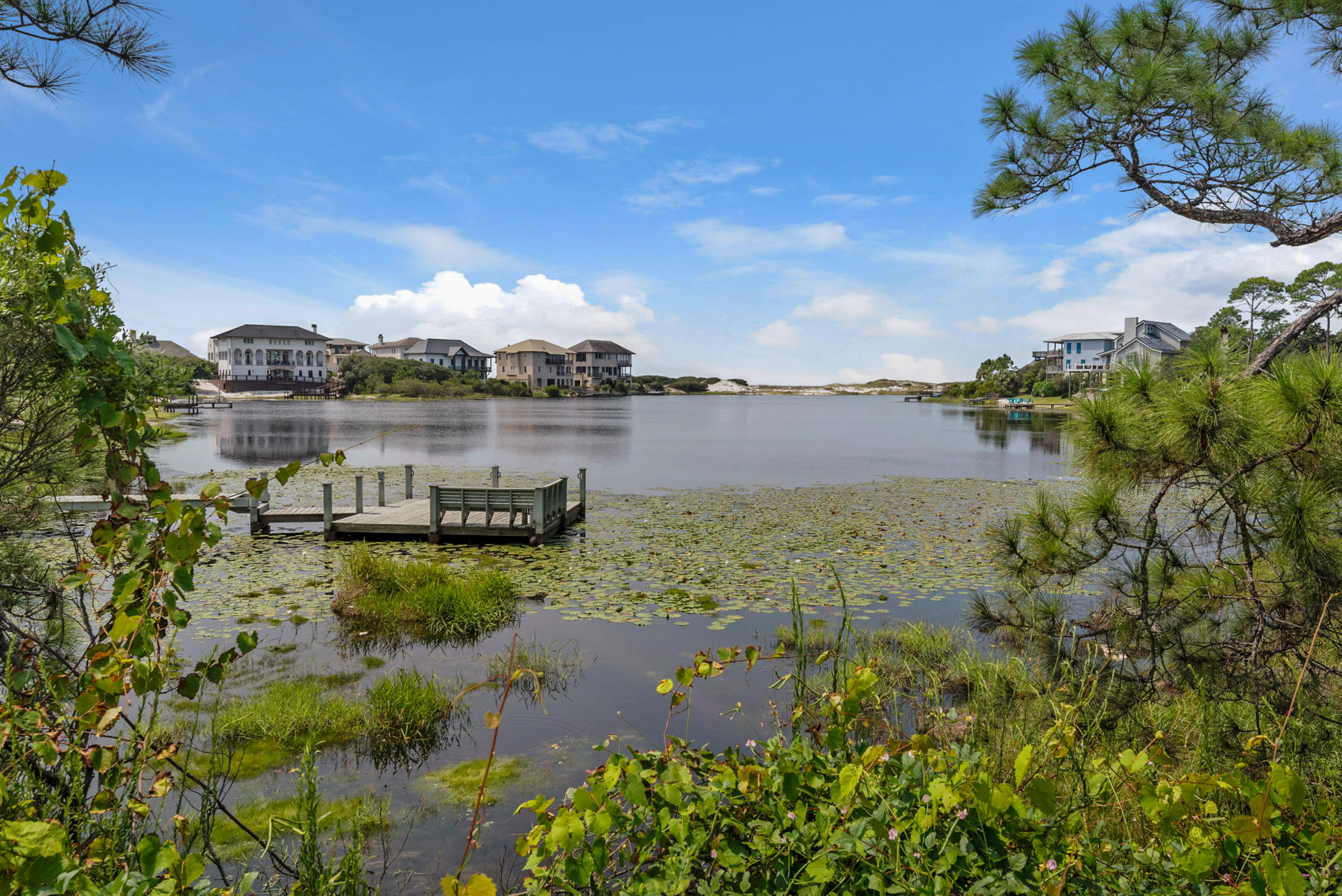 Lot 10 Loon Lake Drive Santa Rosa Beach, FL 32459 - Photo 23 of 49 a view of a lake with houses in the back
