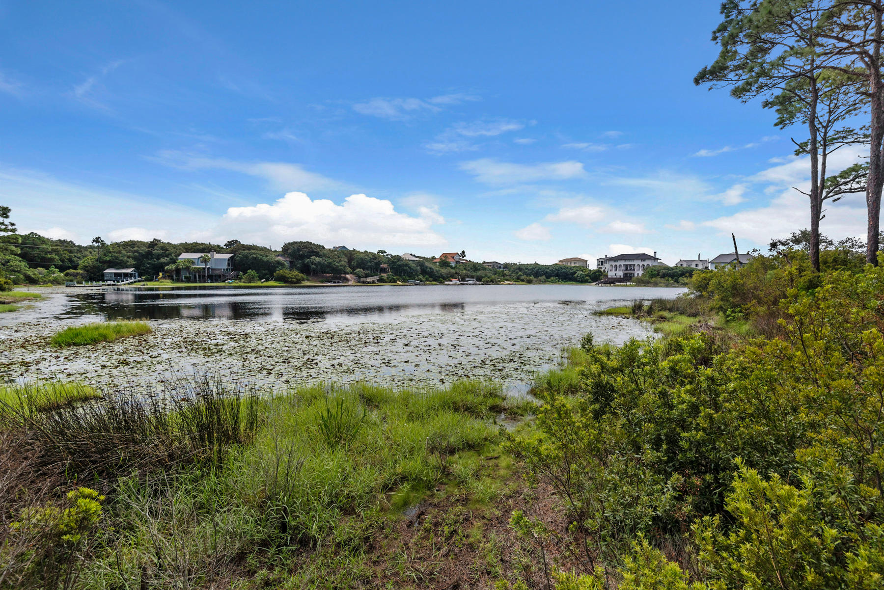 Lot 10 Loon Lake Drive Santa Rosa Beach, FL 32459 - Photo 7 of 49 a view of a lake with houses in the back