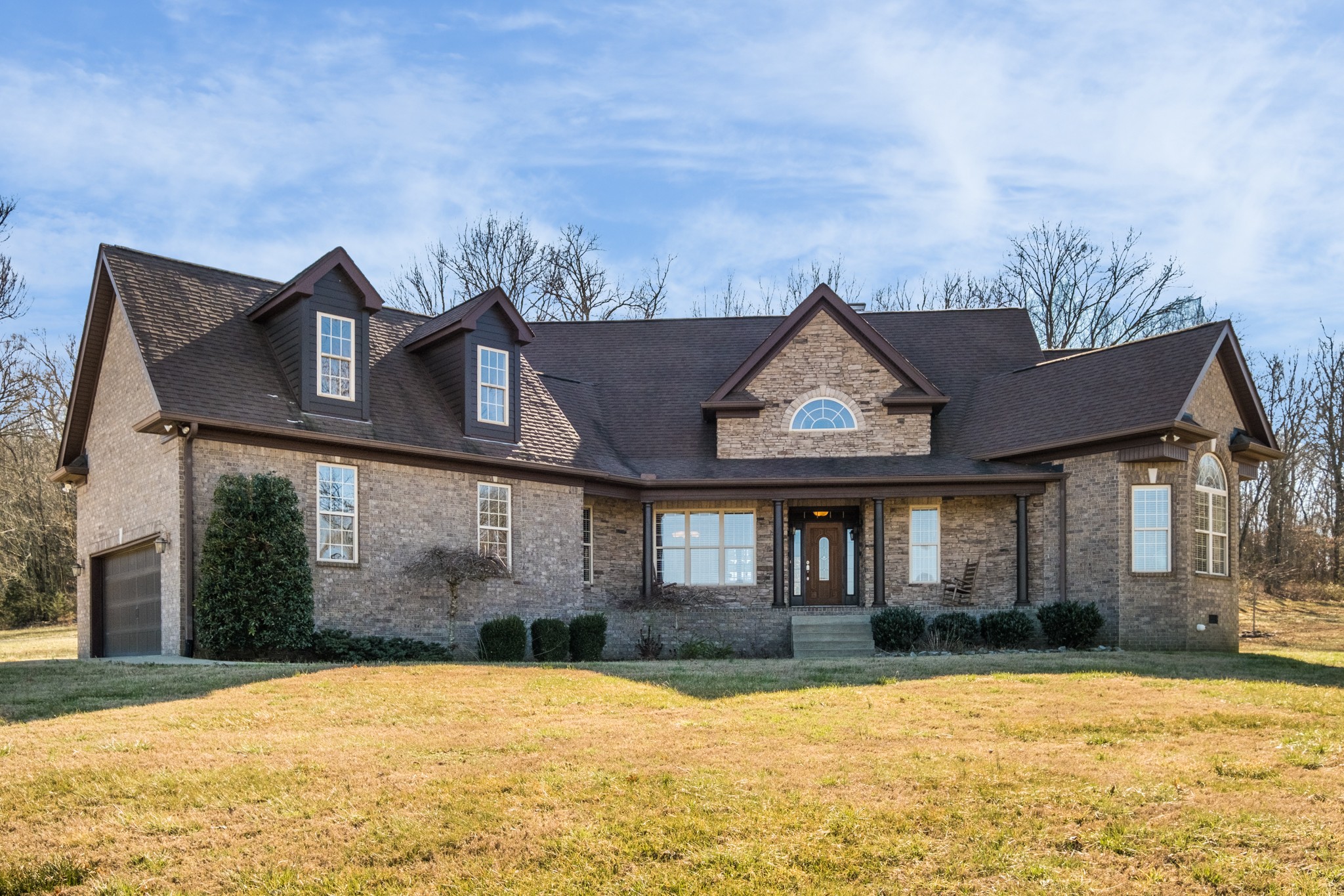 698 Dillon Road Lascassas, TN 37085 - Photo 2 of 53 a front view of a house with a yard