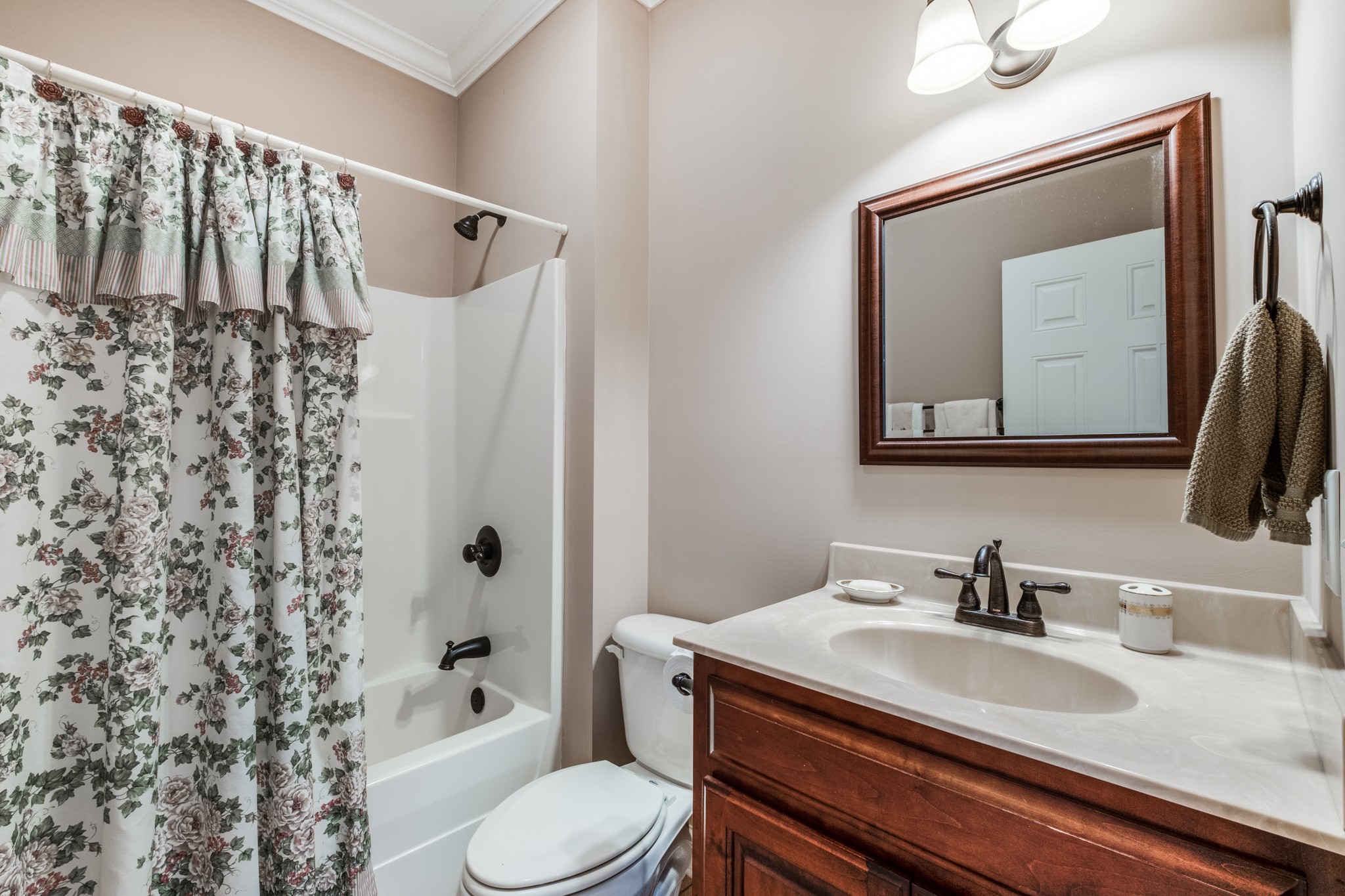 698 Dillon Road Lascassas, TN 37085 - Photo 36 of 53 a bathroom with a granite countertop sink toilet a mirror and shower