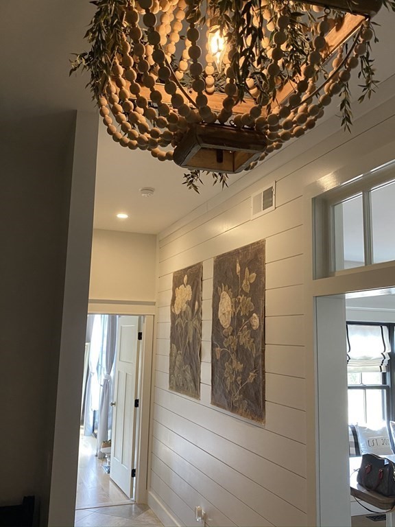 120 Perry Hill Road Acushnet, MA 02743 - Photo 36 of 37 a view of a hallway with wooden shelves