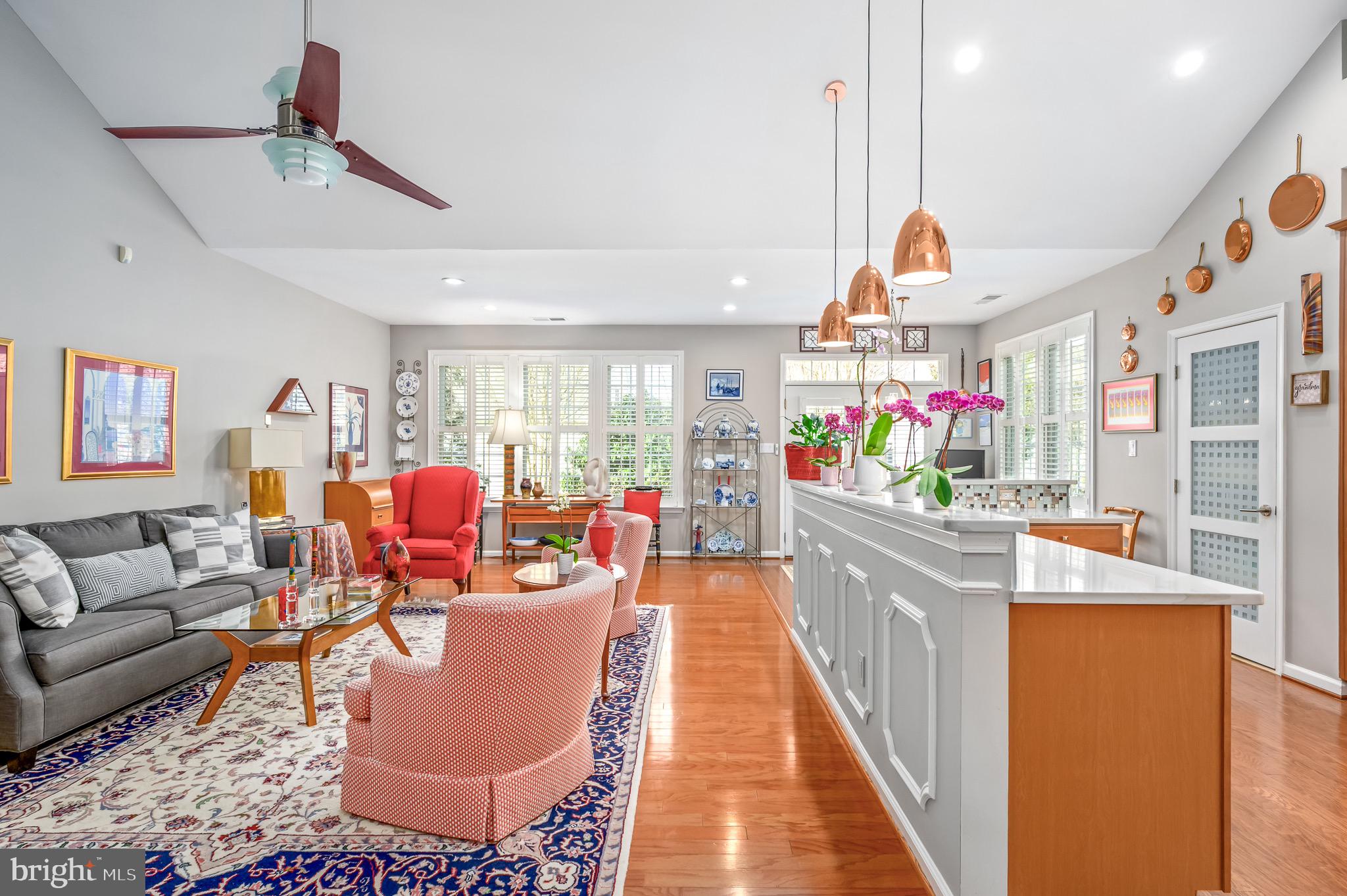 44550 Baltray Circle Ashburn, VA 20147 - Photo 12 of 44 a living room with furniture kitchen and a chandelier