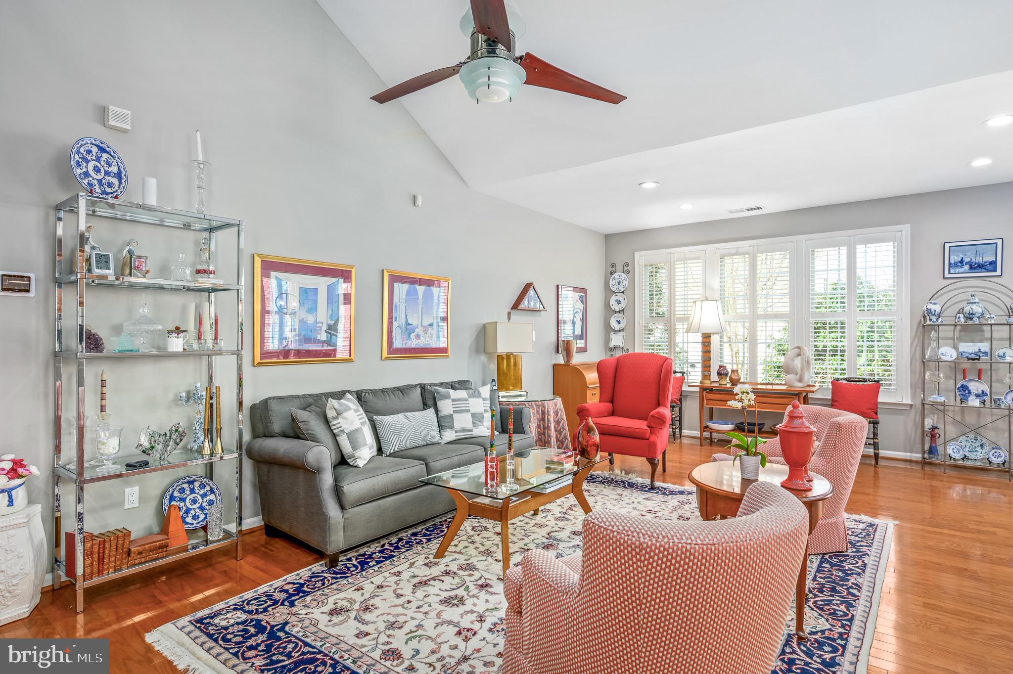 44550 Baltray Circle Ashburn, VA 20147 - Photo 13 of 44 a living room with furniture and a large window
