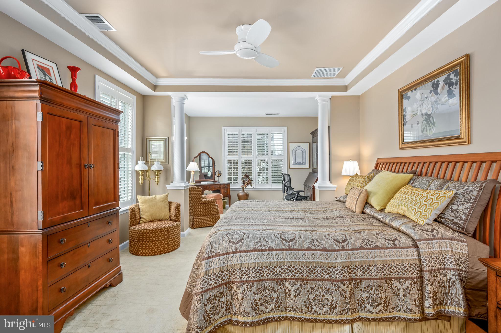 44550 Baltray Circle Ashburn, VA 20147 - Photo 23 of 44 a bedroom with a large bed and a window