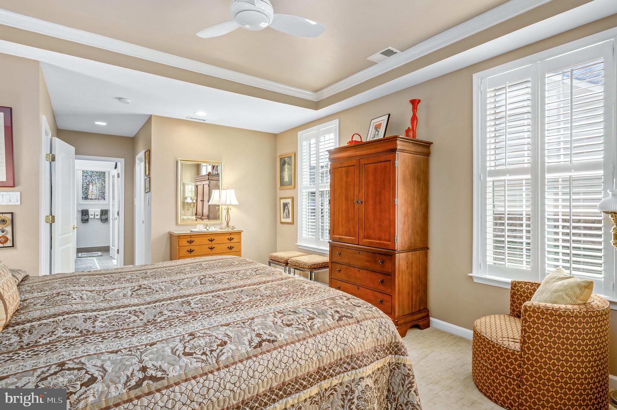 44550 Baltray Circle Ashburn, VA 20147 - Photo 26 of 44 a bedroom with a bed and wooden floor