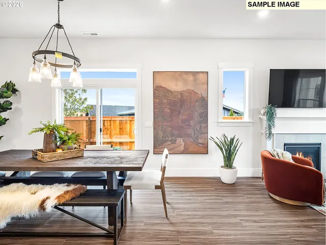 a workspace with furniture window and wooden floor