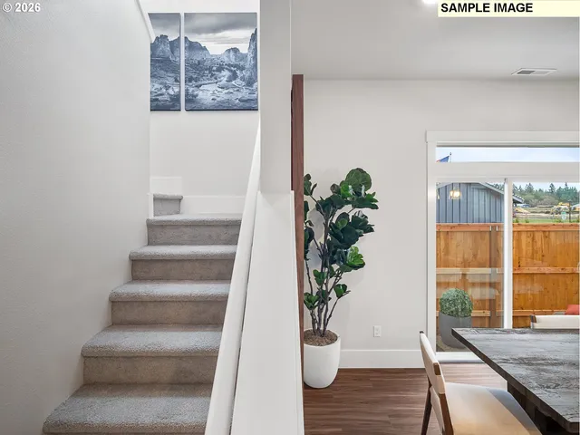 a view of entryway with wooden floor