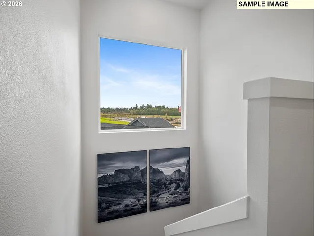 a view of a hallway with an empty room