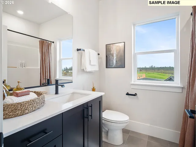 a view of storage and utility room with washer and dryer