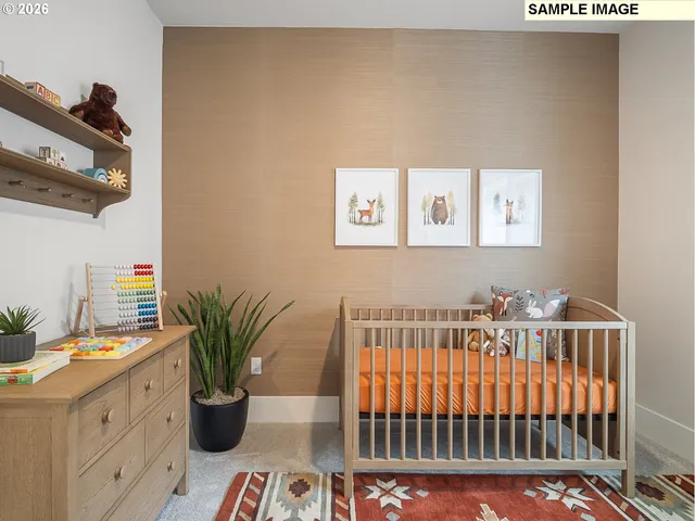 a bedroom with bed and a large window