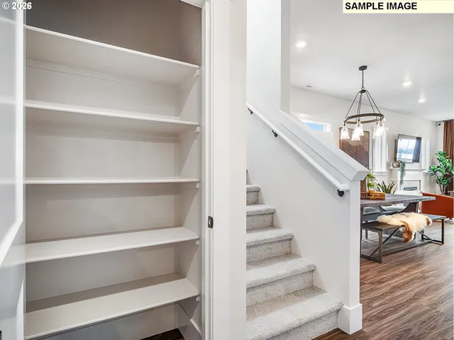 a view of a balcony with a potted plant