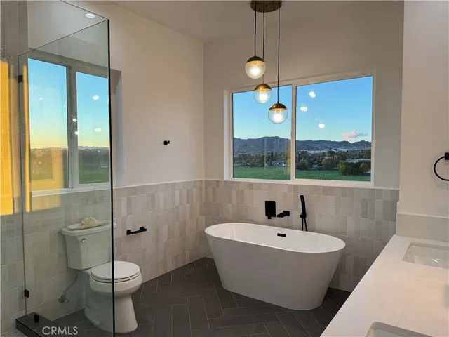 a bathroom with a sink and window