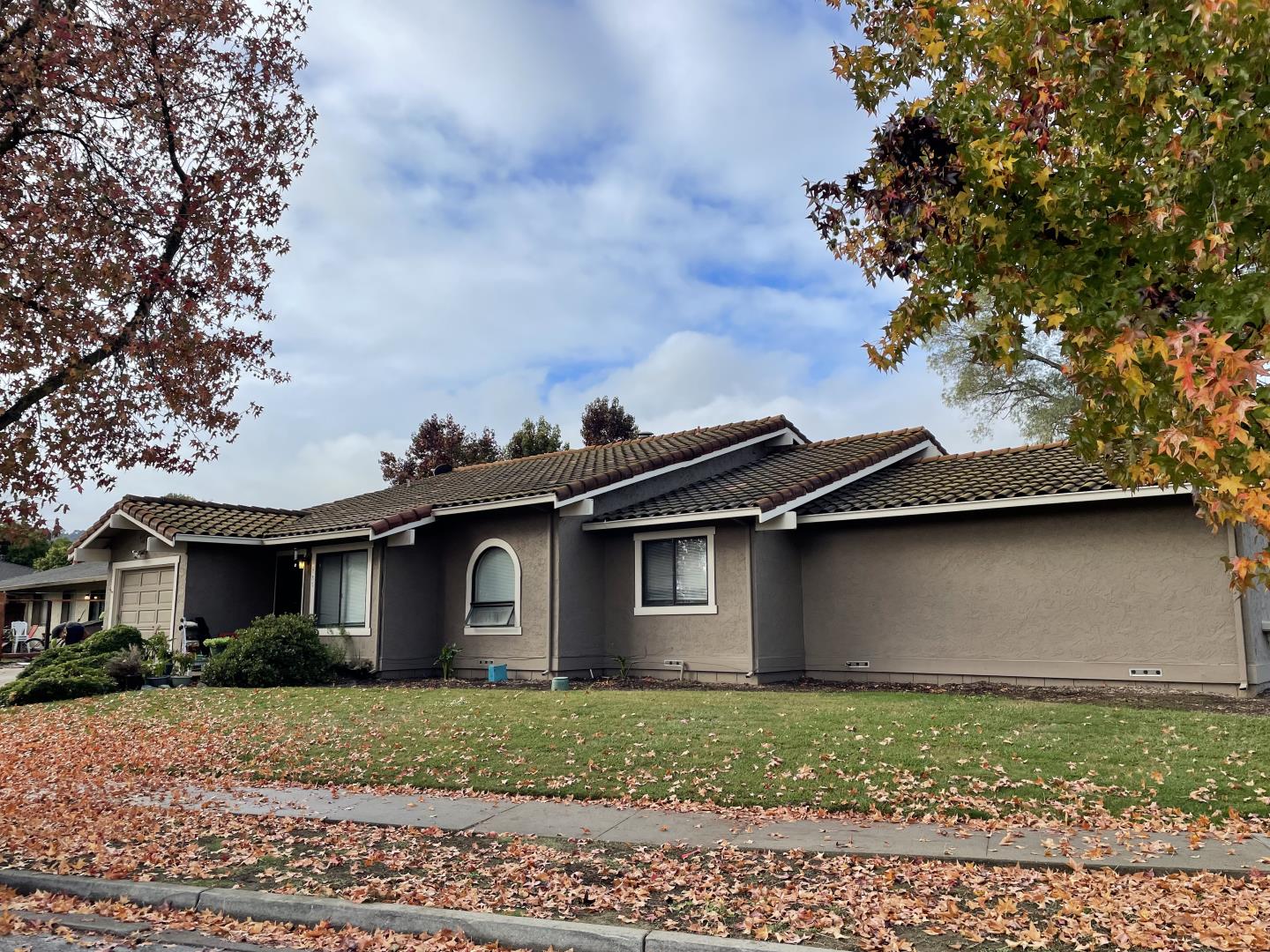6790 Filbro Drive Gilroy, CA 95020 - Photo 24 of 43 a front view of a house with a garden