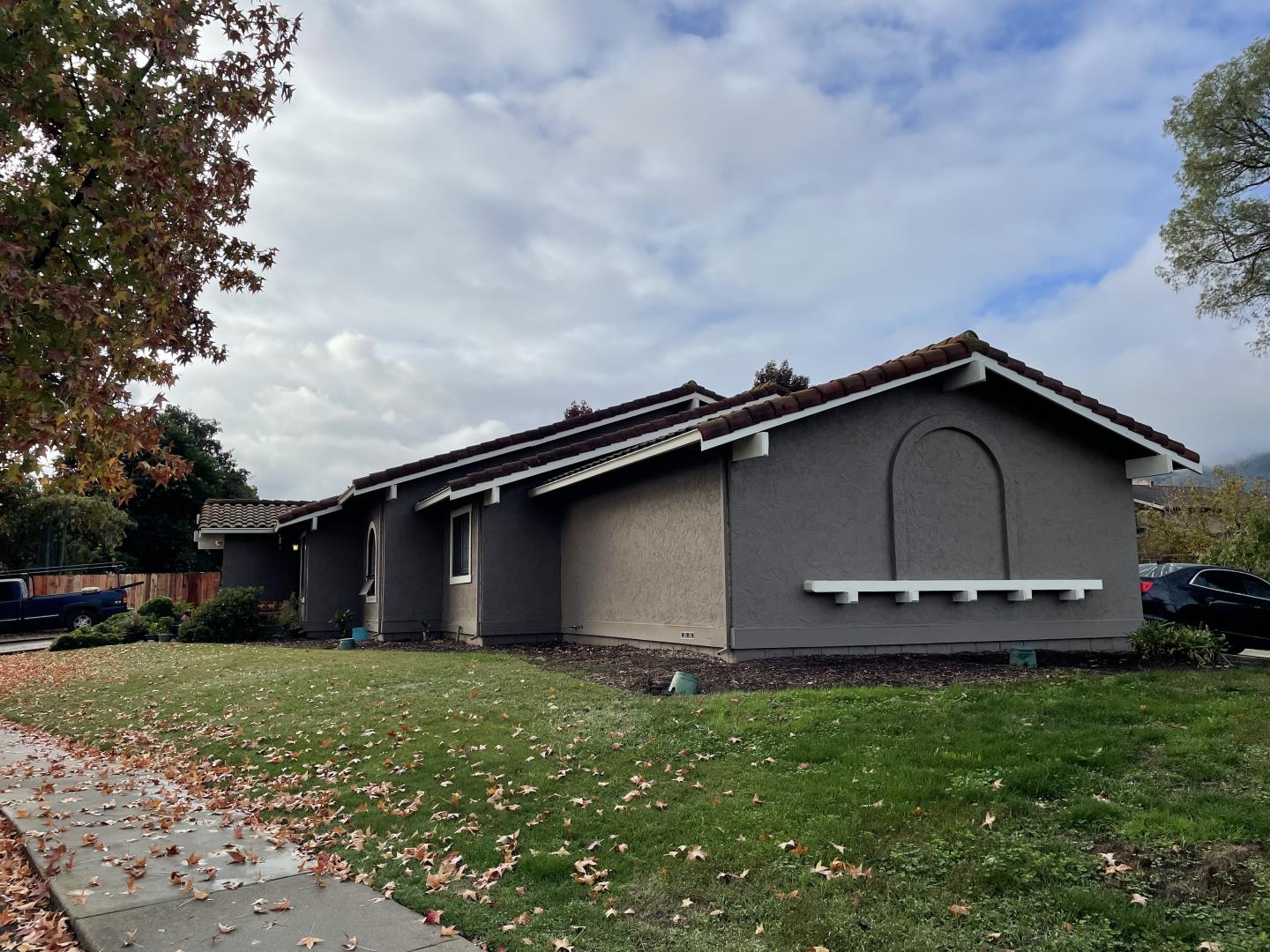 6790 Filbro Drive Gilroy, CA 95020 - Photo 26 of 43 a front view of a house with a garden and yard