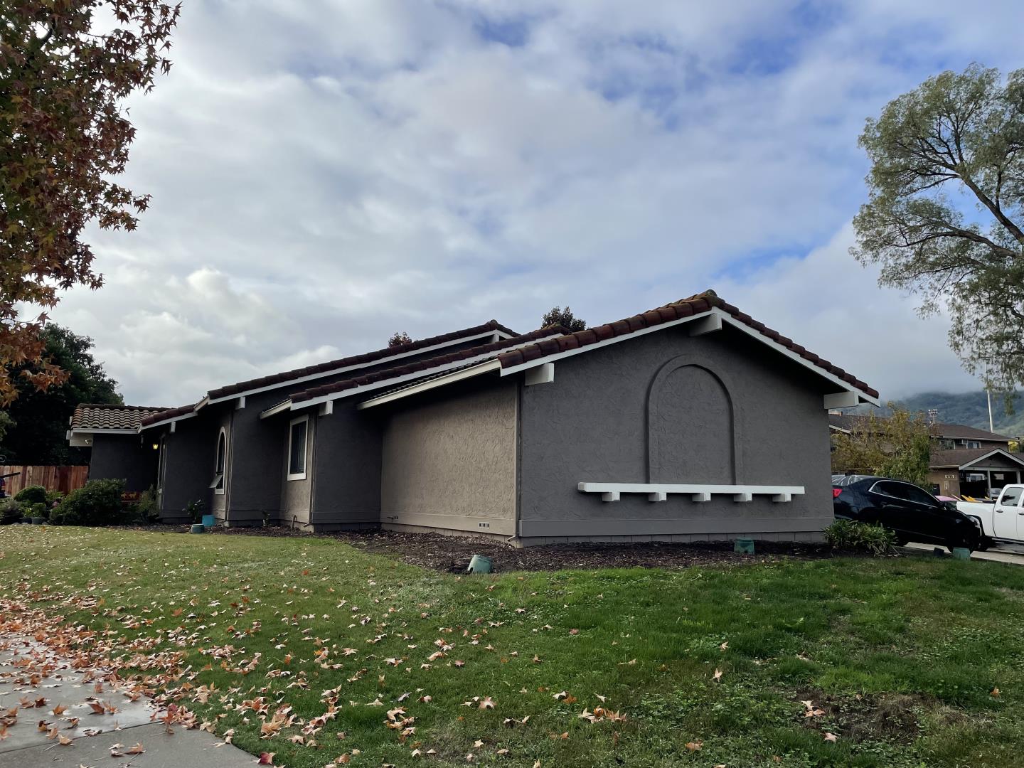 6790 Filbro Drive Gilroy, CA 95020 - Photo 27 of 43 a front view of a house with a garden and yard
