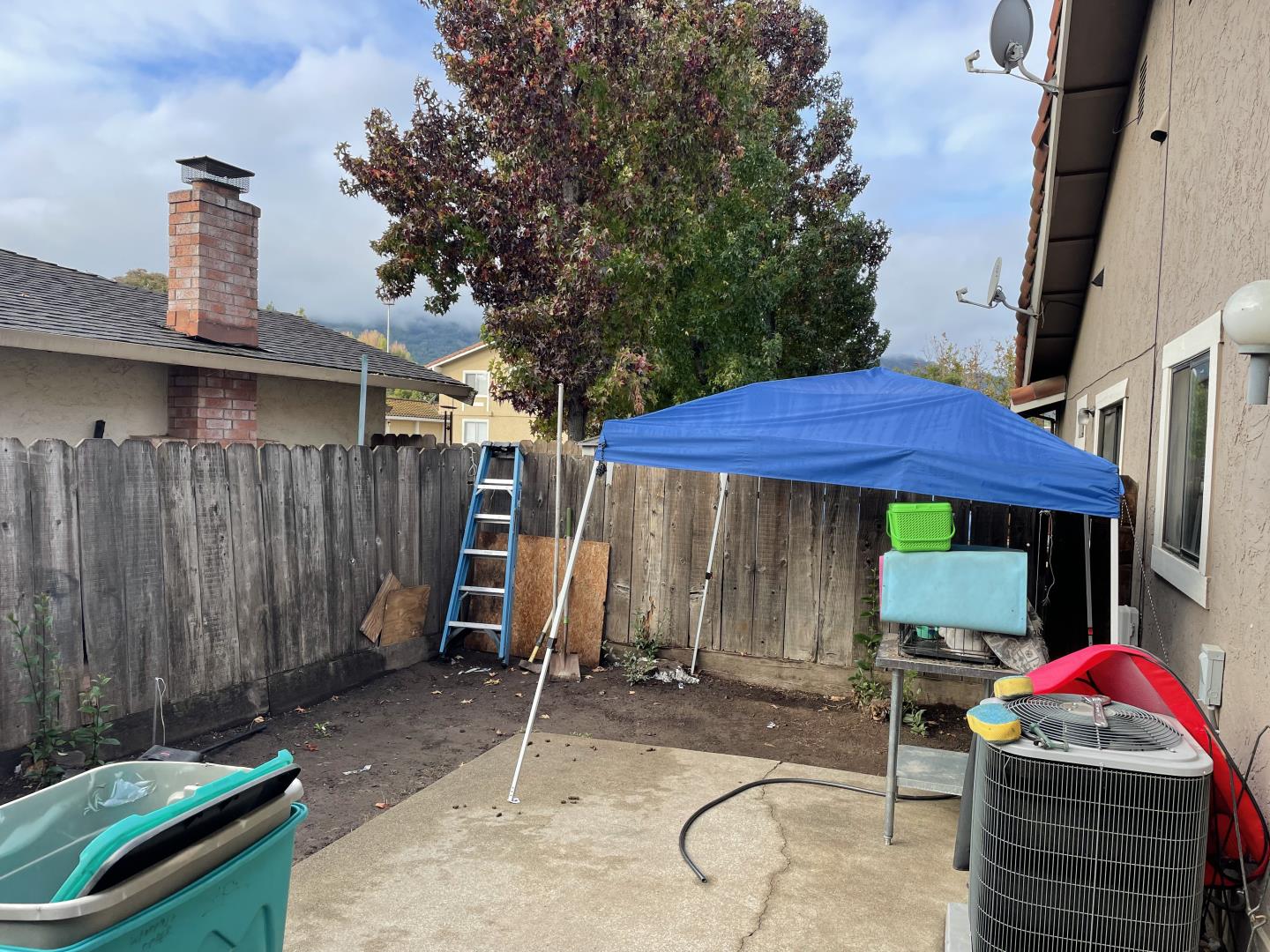 6790 Filbro Drive Gilroy, CA 95020 - Photo 35 of 43 a backyard of a house with barbeque oven table and chairs