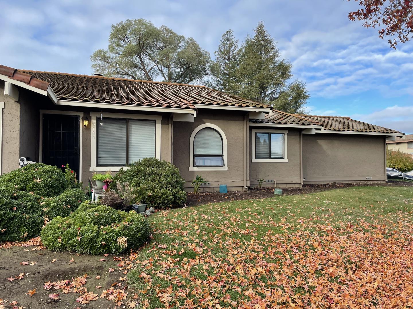 6790 Filbro Drive Gilroy, CA 95020 - Photo 6 of 43 a front view of a house with garden