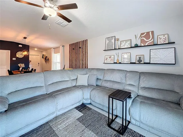 a living room with furniture and furniture