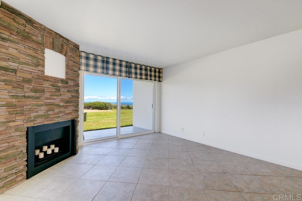 640 West Solana Circle, Unit 1 Solana Beach, CA 92075 - Photo 19 of 42 a view of a livingroom with a fireplace