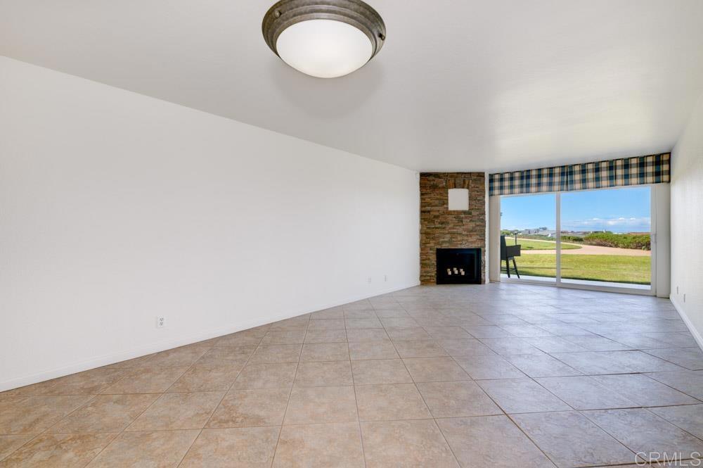 640 West Solana Circle, Unit 1 Solana Beach, CA 92075 - Photo 21 of 42 a view of a room with a sink and a fireplace