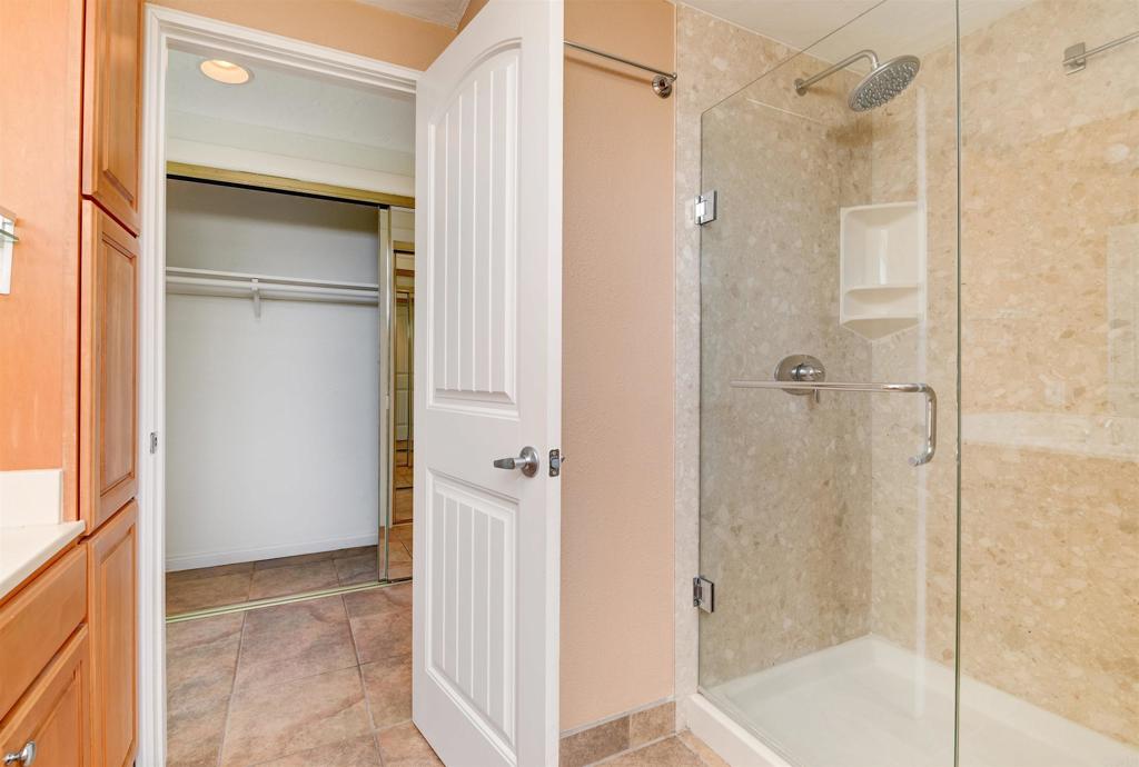 640 West Solana Circle, Unit 1 Solana Beach, CA 92075 - Photo 26 of 42 a bathroom with a shower and a glass door