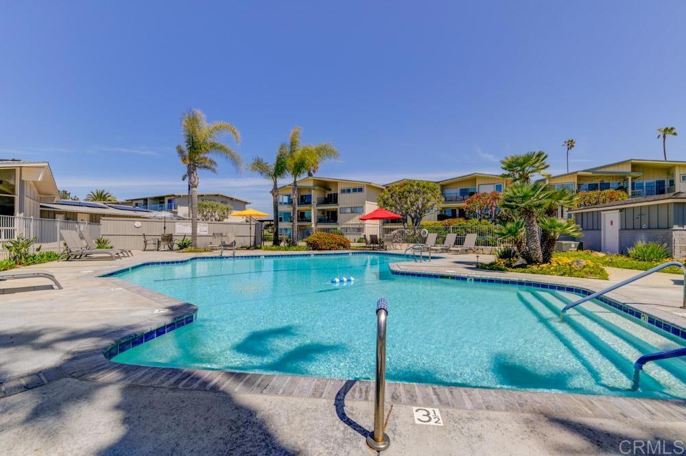 640 West Solana Circle, Unit 1 Solana Beach, CA 92075 - Photo 41 of 42 a view of a swimming pool with a patio