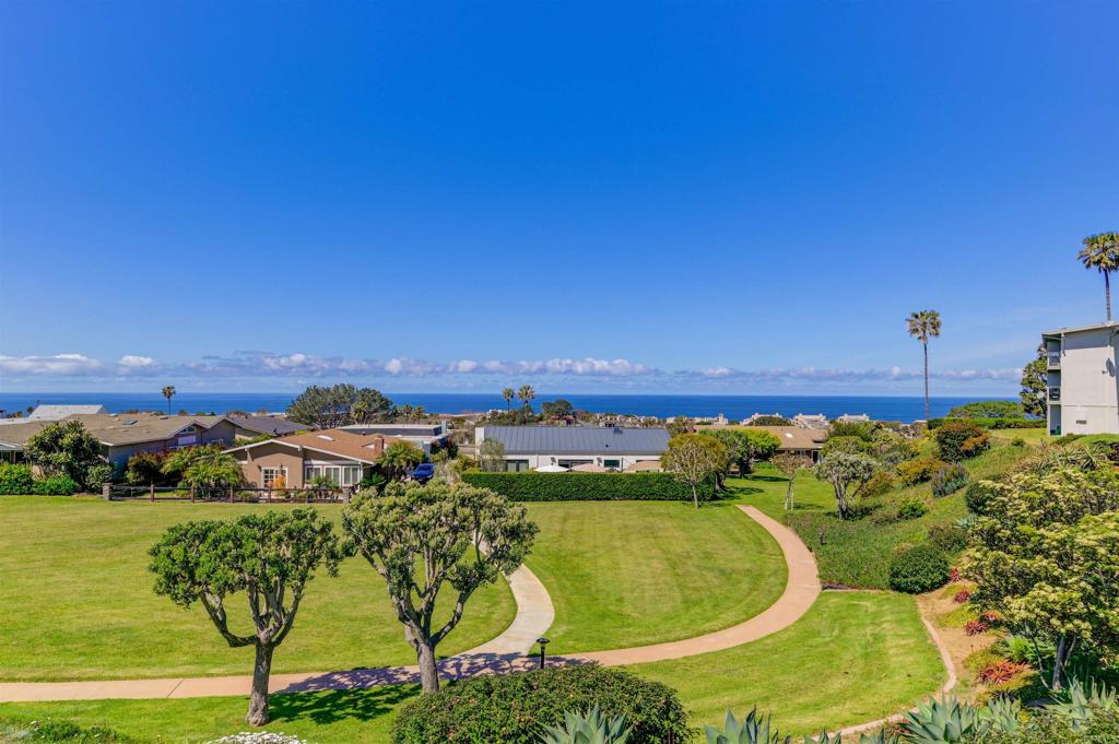 640 West Solana Circle, Unit 1 Solana Beach, CA 92075 - Photo 7 of 42 a view of a swimming pool with a lake view