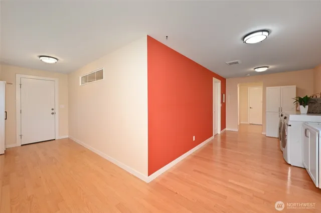 a view of a livingroom with a kitchen