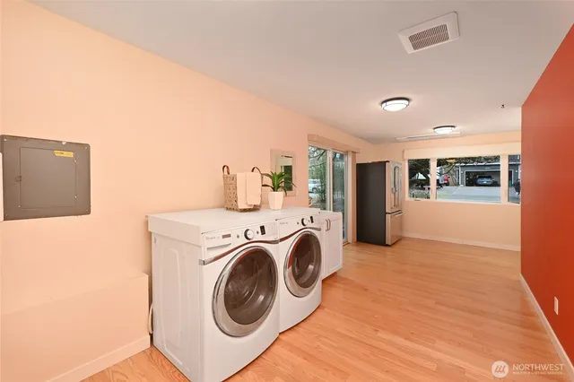 a view of a kitchen with washer and dryer