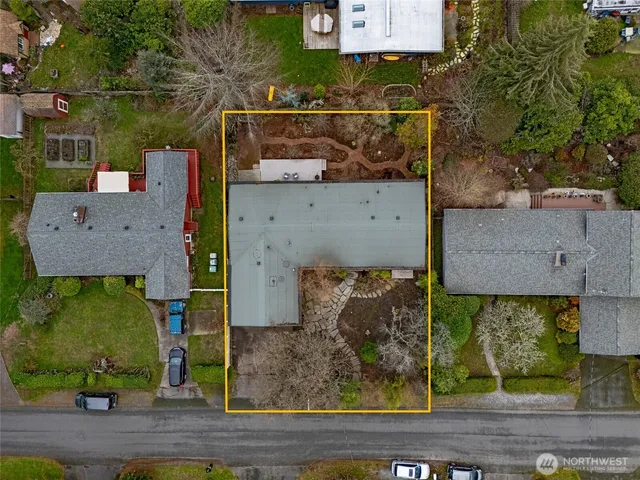 an aerial view of a houses with outdoor space