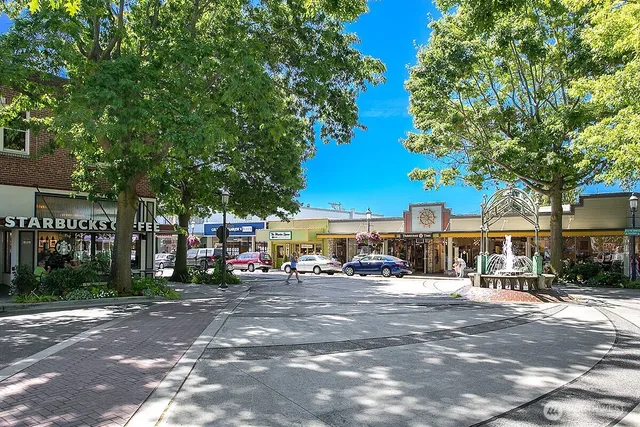 a front view of a house with sitting area