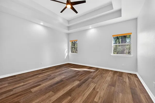 a bathroom with a shower and a sink