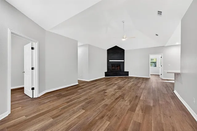 a kitchen with a stove top oven sink and cabinets