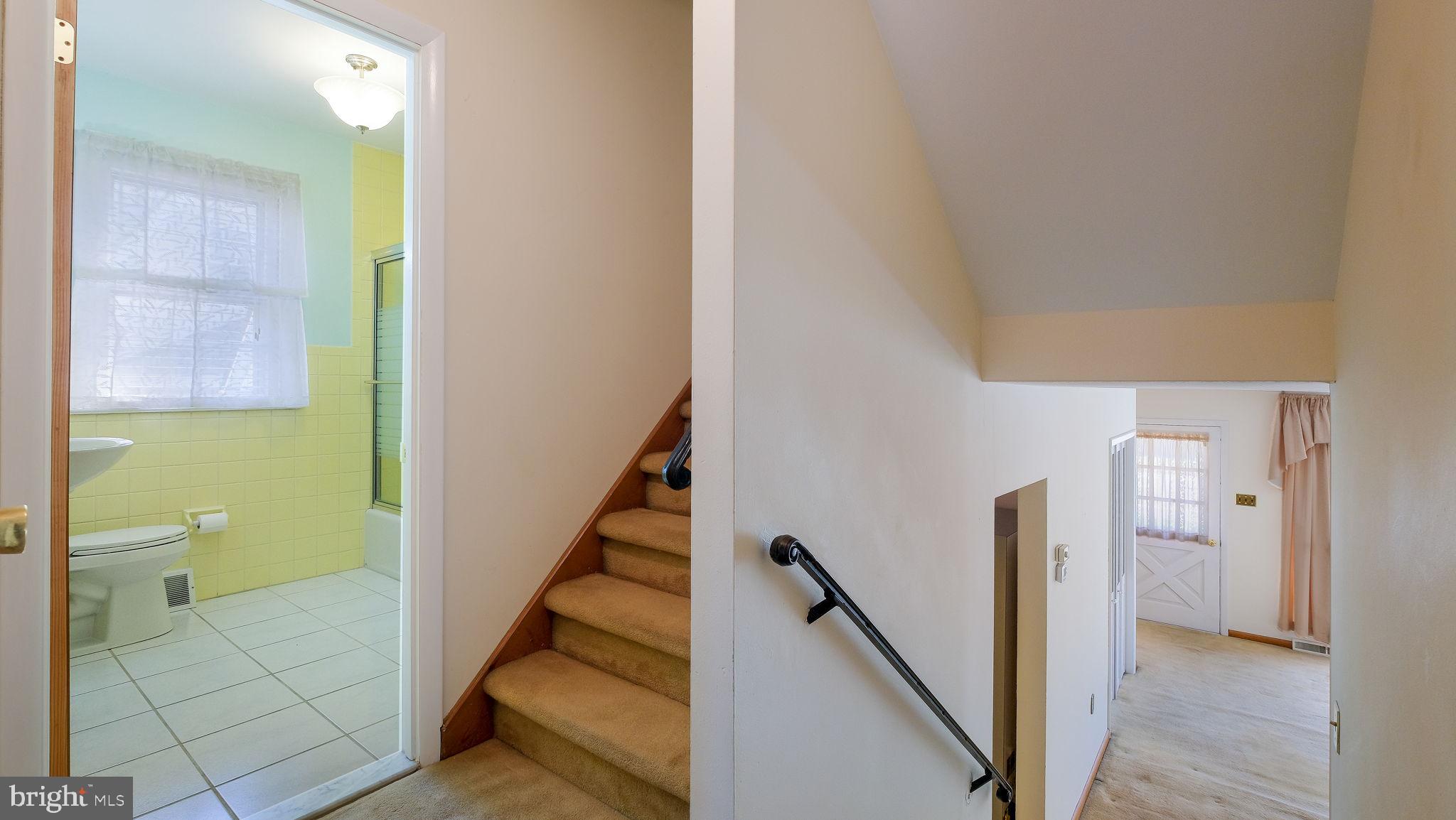 2473 Susquehanna Road Abington, PA 19001 - Photo 21 of 46 a view of a hallway with wooden floor and staircase