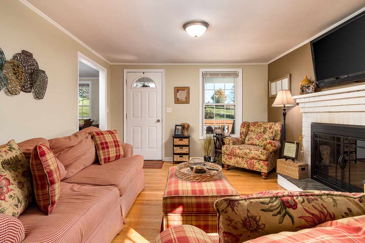 50 Maury Mill Road Verona, VA 24482 - Photo 8 of 36 a living room with furniture and a flat screen tv