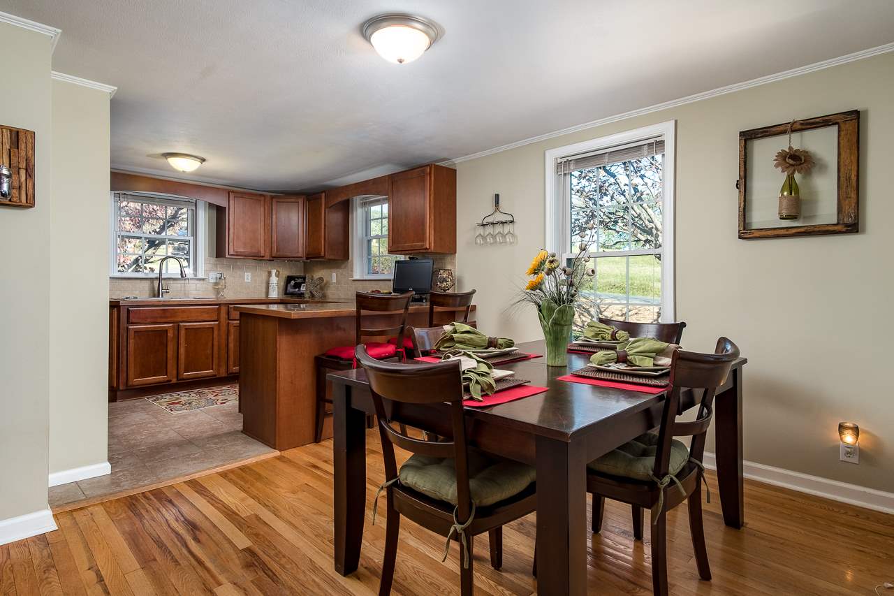 50 Maury Mill Road Verona, VA 24482 - Photo 10 of 36 a view of a dining room with furniture and wooden floor