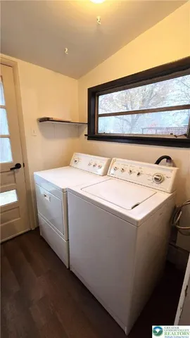 a utility room with dryer and washer