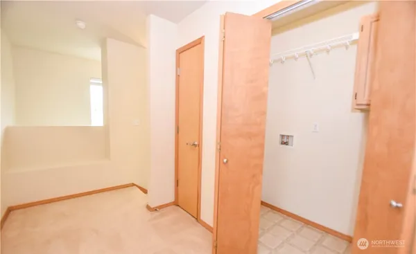 a view of a bathroom with a shower and a sink