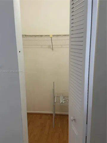 a bathroom with a glass door