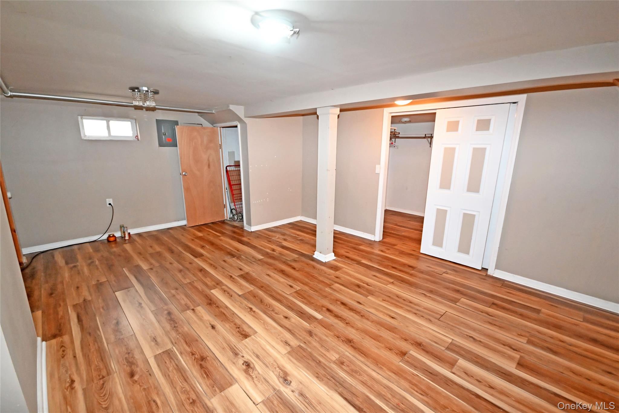 89 Osborne Road West Hempstead, NY 11552 - Photo 48 of 50 Basement featuring light wood-style floors
