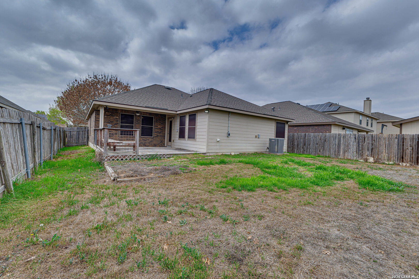 348 Buckboard Lane Cibolo, TX 78108 - Photo 19 of 23 a view of a house with yard and a garden