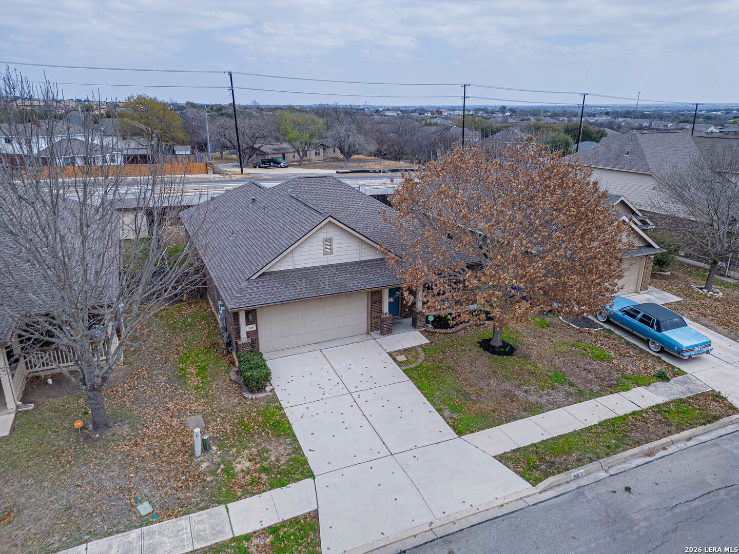 348 Buckboard Lane Cibolo, TX 78108 - Photo 2 of 23 a view of a house with a yard