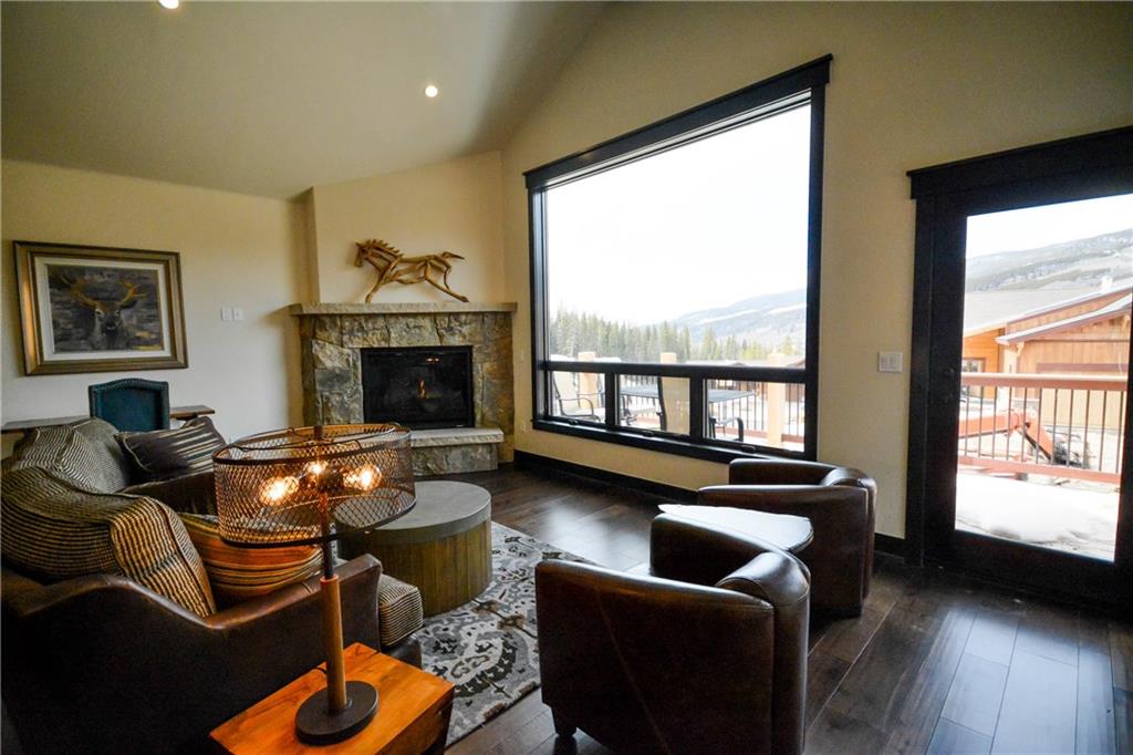 747 Independence Road, Unit 14C Keystone, CO 80435 - Photo 1 of 25 a living room with furniture and a fireplace