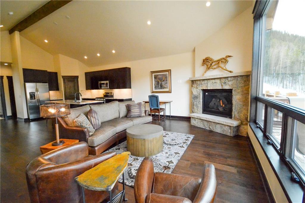 747 Independence Road, Unit 14C Keystone, CO 80435 - Photo 12 of 25 a living room with furniture and a fireplace