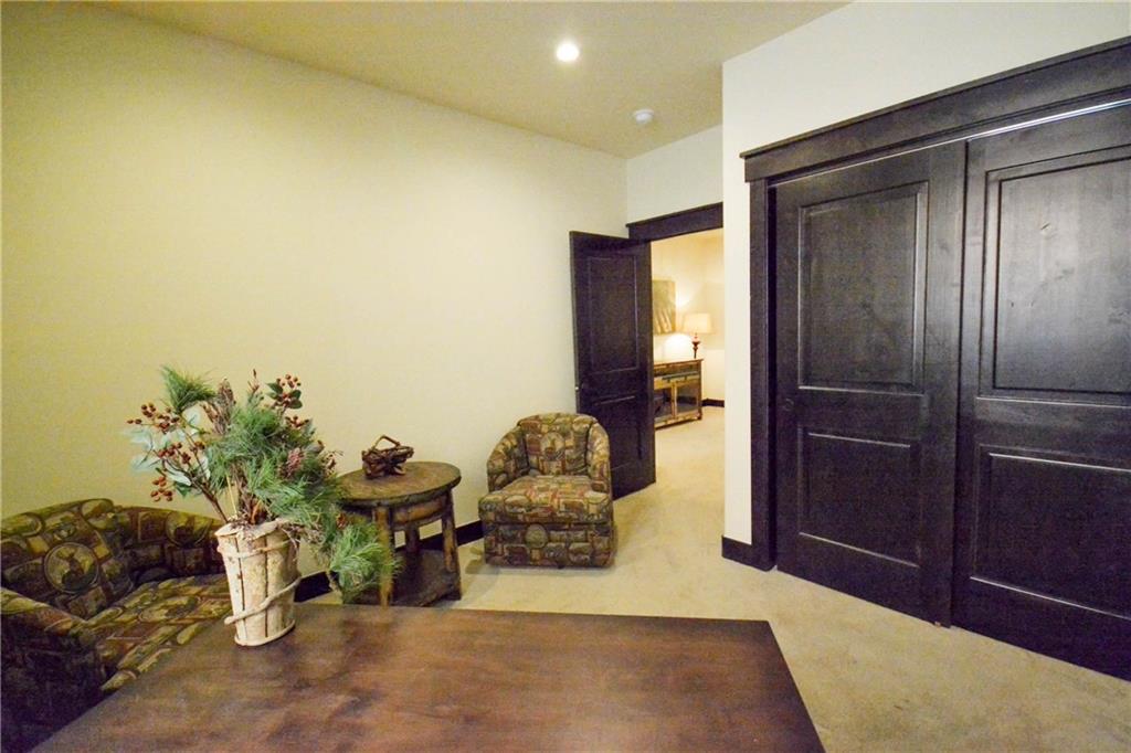 747 Independence Road, Unit 14C Keystone, CO 80435 - Photo 16 of 25 a hallway with a couch