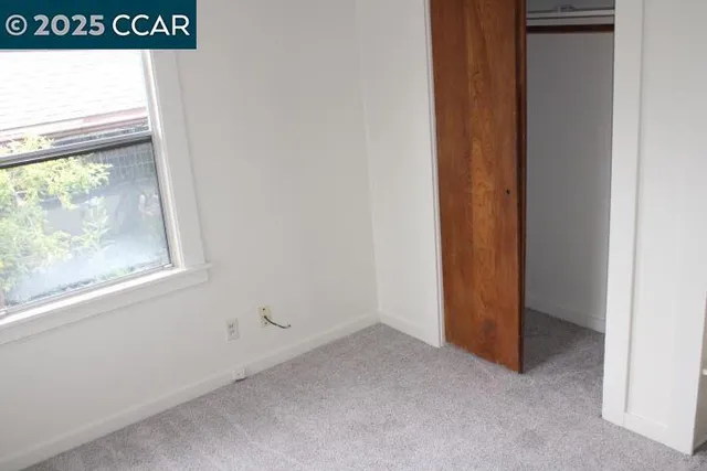 a view of a room that has a window