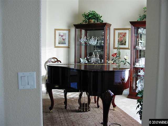 2184 South Tesuque Road Reno, NV 89511 - Photo 5 of 5 a room with furniture and chandelier